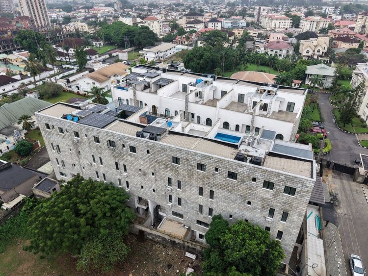 Aerial view of completed multi-unit residential development with rooftop pool, Lekki, Lagos