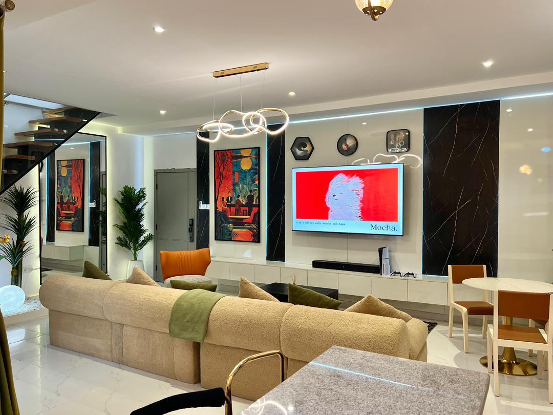 Fully furnished, lived-in living room in a completed managed unit