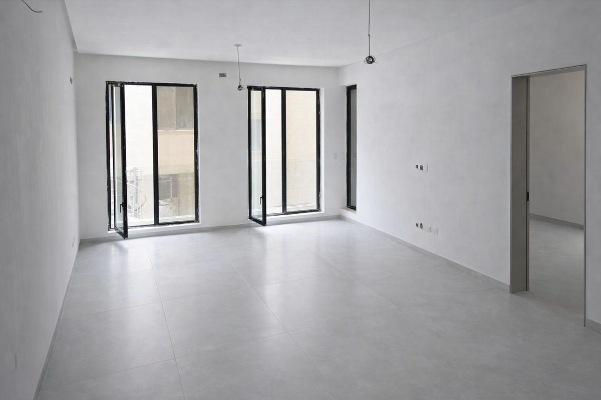 Bare finished apartment unit awaiting snagging and handover audit